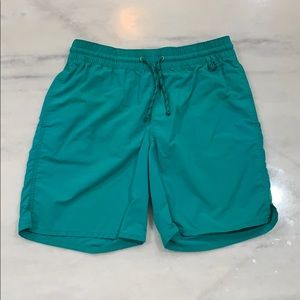 Men’s green bathing suit.